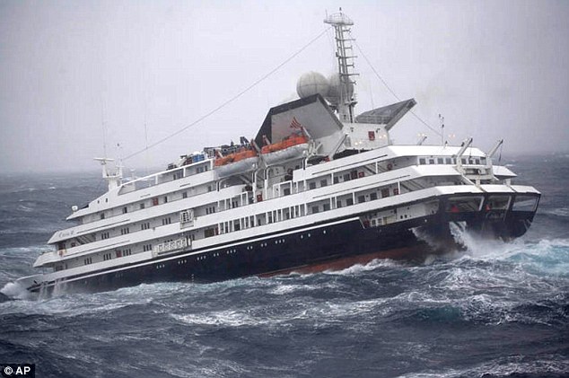 Floundering: The vessel struggles through heavy seas and 55mph winds in the Drake Passage 